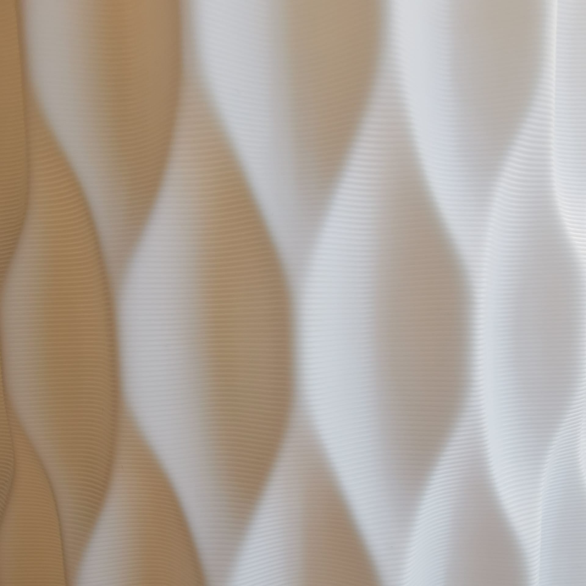 Wavy patterned fabric in beige and white