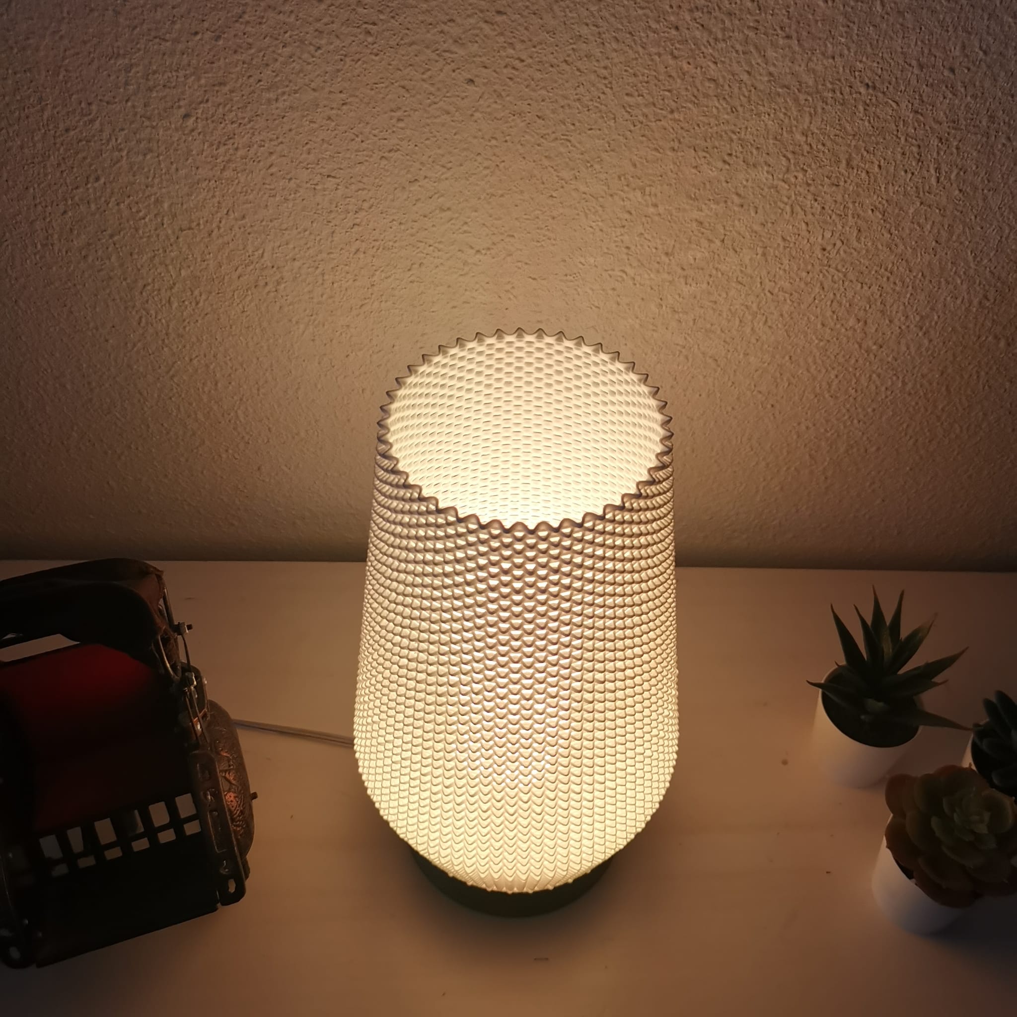 Decorative lamp with honeycomb pattern on a surface with a soft background