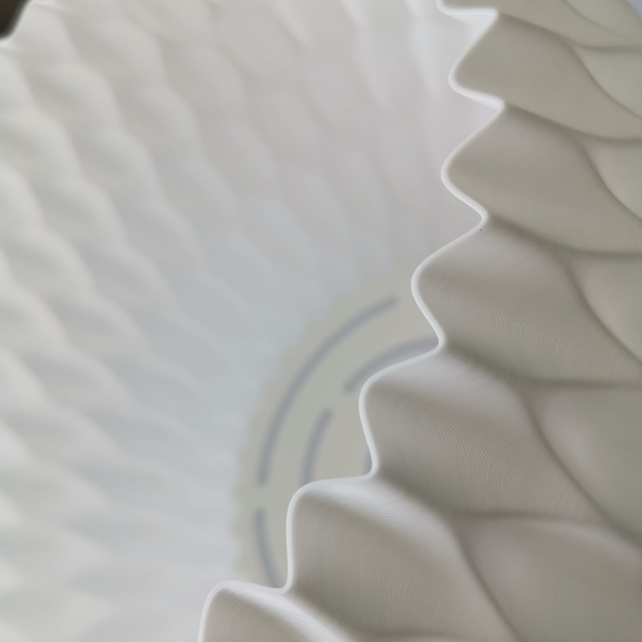 Close-up of a textured white fabric surface