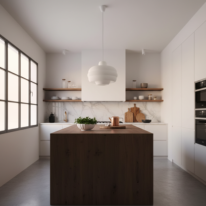 Minimalist pendant lamp above a kitchen island in a bright modern kitchen interior.